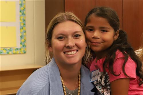 Starr teacher and student smiling